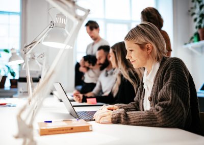 Teamwork in modern coworking space