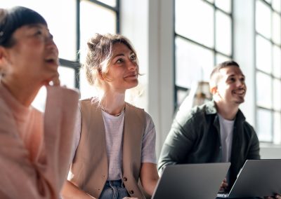 Young Professionals Collaborating in Modern Co-Working Space